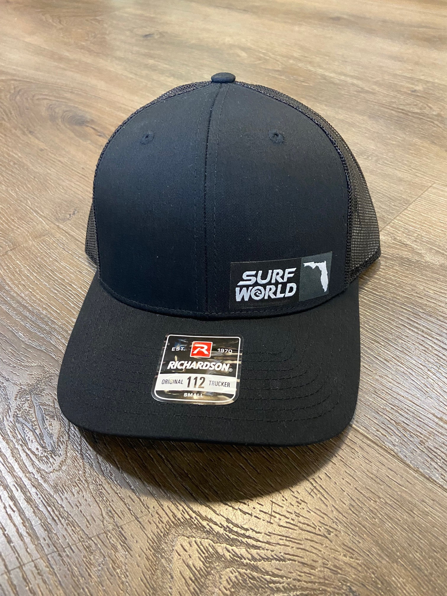 Surf World Florida Patch Trucker Hat Hats Black Side Logo